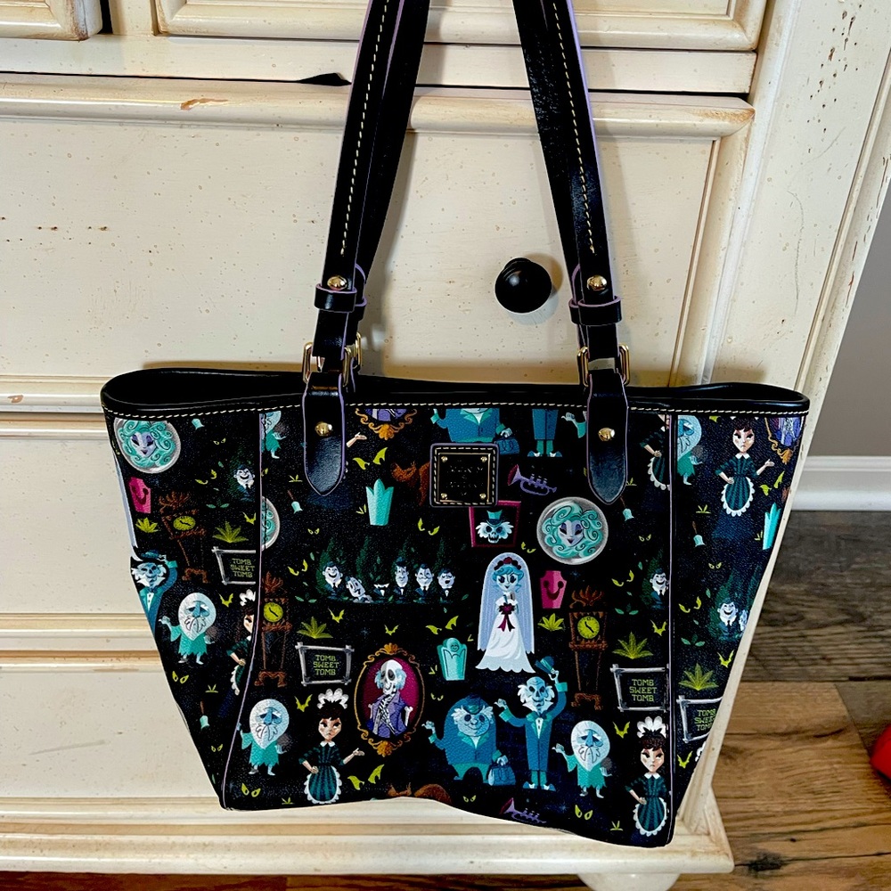 Like new Disney Dooney & Bourke haunted mansion